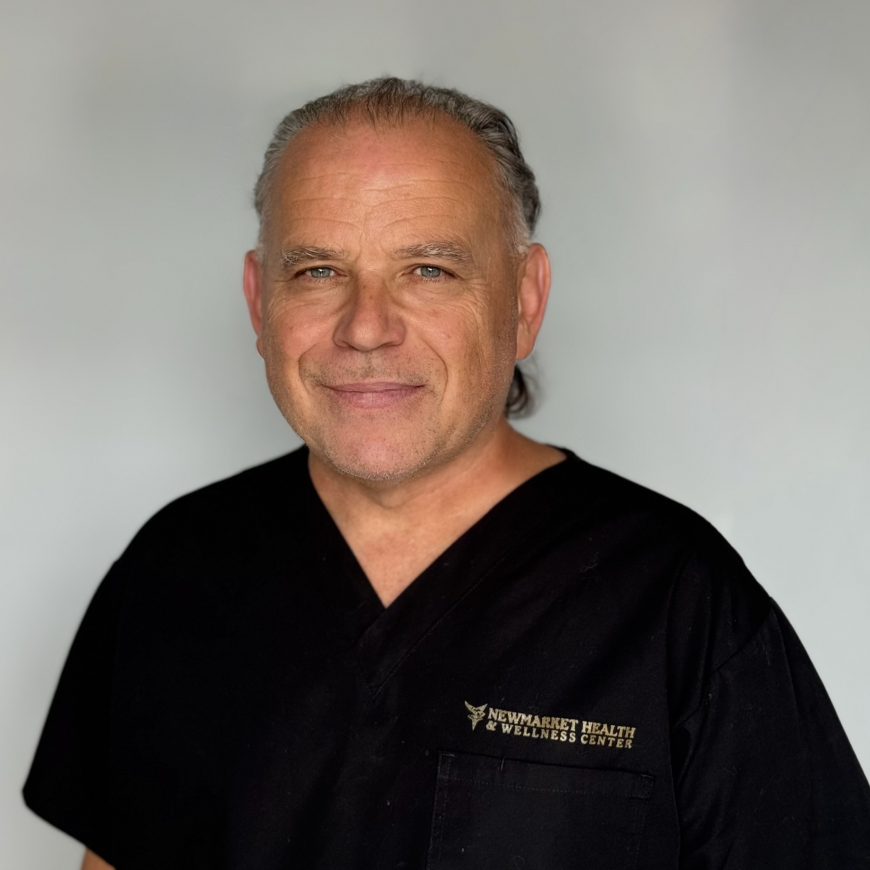 Man in Newmarket Health uniform