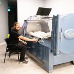 Person operating hyperbaric oxygen chamber